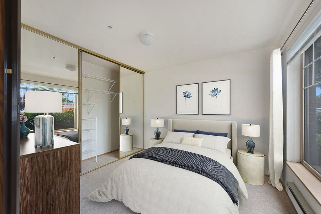 Bedroom with staged furniture at Boardwalk in Olympia WA